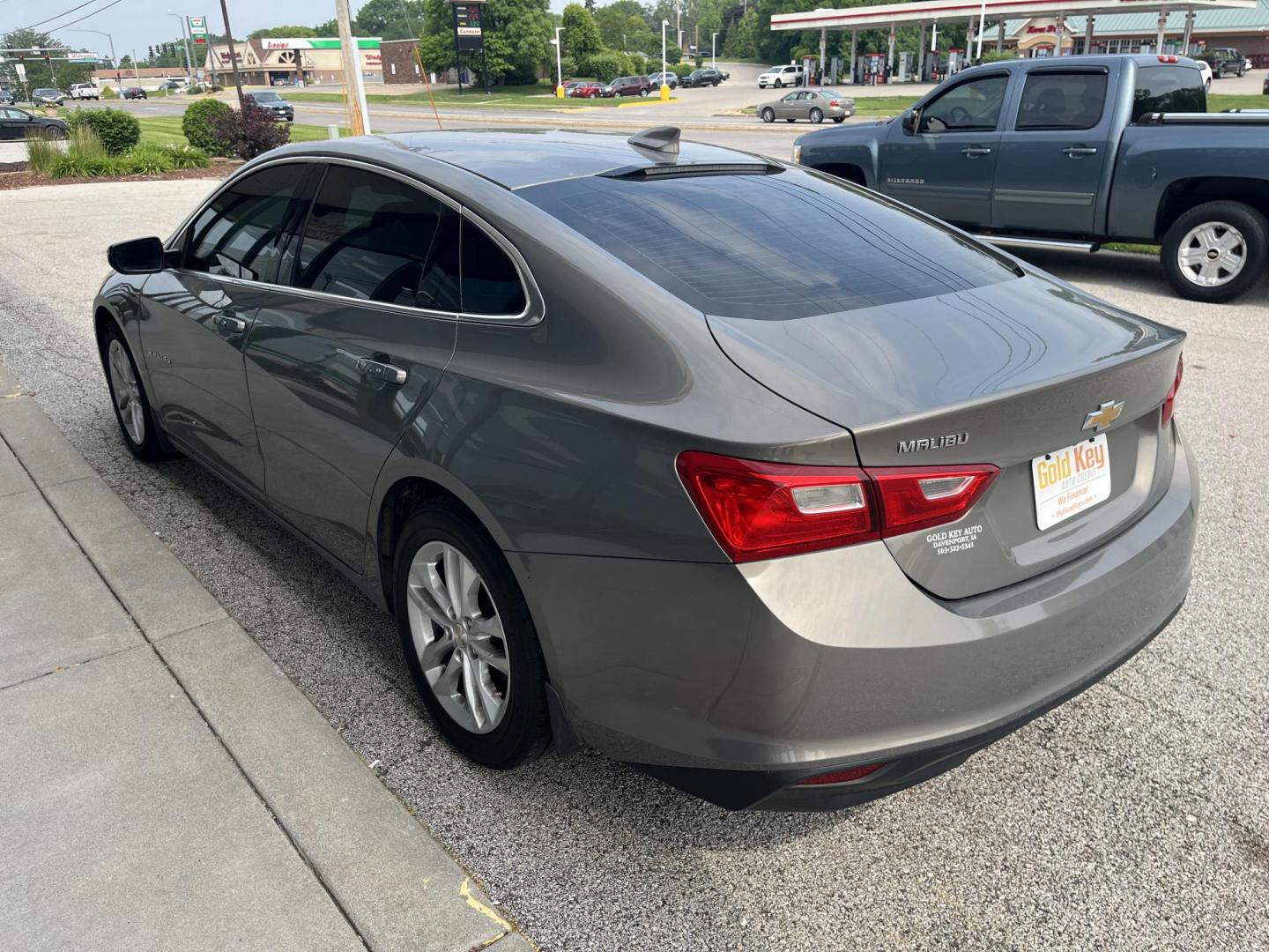 2017 Autumn Bronze Metallic Chevrolet Malibu 1LT (1G1ZE5ST4HF) with an 1.5L I-4 gasoline direct injection engine, located at 1633 W Kimberly, Davenport, IA, 52806, (563) 323-5341, 41.559456, -90.598732 - Photo#3