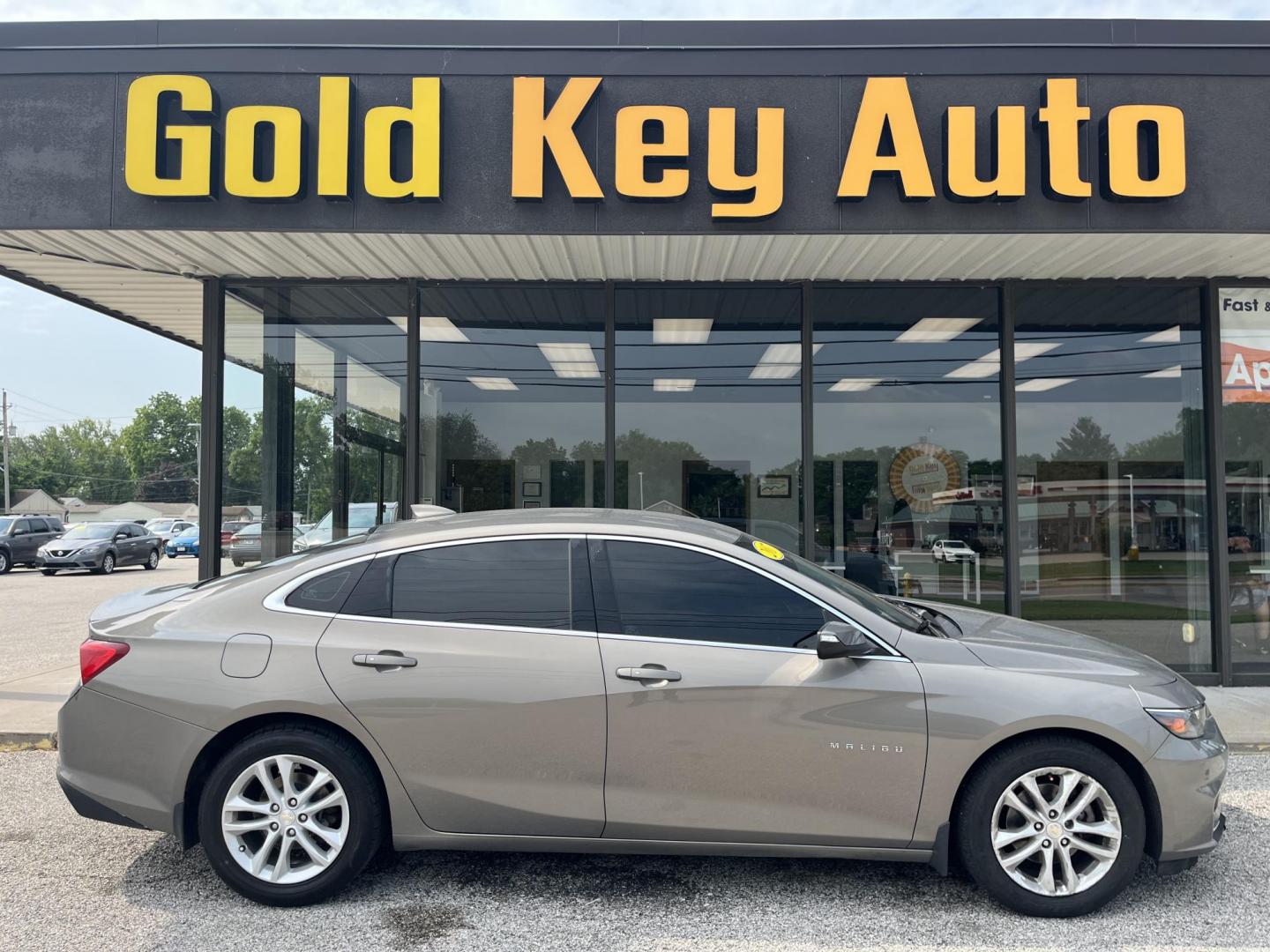 2017 Autumn Bronze Metallic Chevrolet Malibu 1LT (1G1ZE5ST4HF) with an 1.5L I-4 gasoline direct injection engine, located at 1633 W Kimberly, Davenport, IA, 52806, (563) 323-5341, 41.559456, -90.598732 - Photo#0