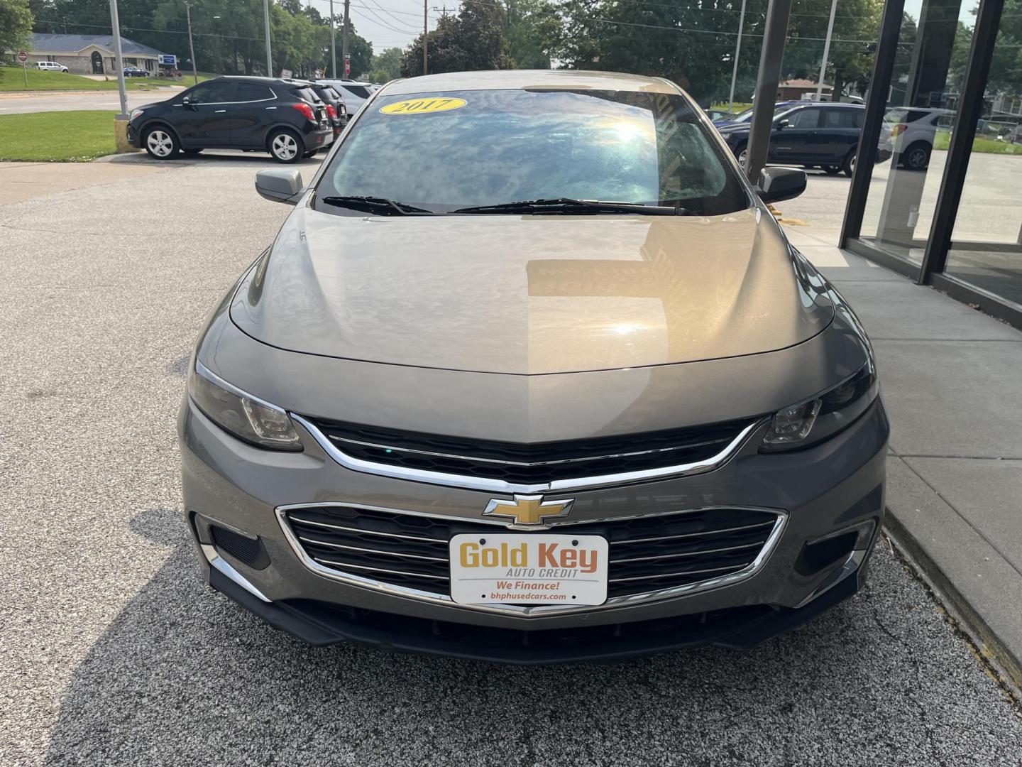 2017 Autumn Bronze Metallic Chevrolet Malibu 1LT (1G1ZE5ST4HF) with an 1.5L I-4 gasoline direct injection engine, located at 1633 W Kimberly, Davenport, IA, 52806, (563) 323-5341, 41.559456, -90.598732 - Photo#1