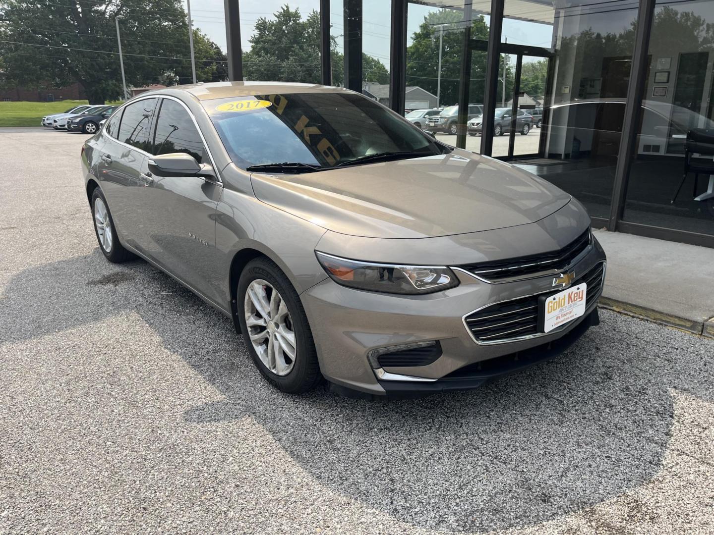 2017 Autumn Bronze Metallic Chevrolet Malibu 1LT (1G1ZE5ST4HF) with an 1.5L I-4 gasoline direct injection engine, located at 1633 W Kimberly, Davenport, IA, 52806, (563) 323-5341, 41.559456, -90.598732 - Photo#2