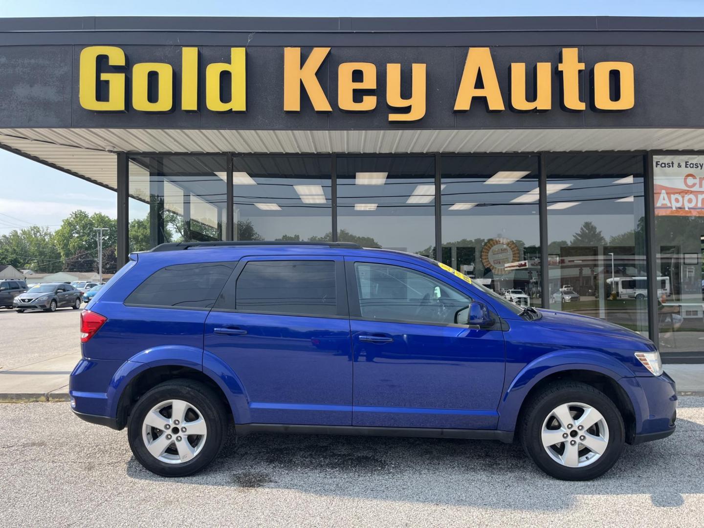 2012 Blue Pearlcoat Dodge Journey SXT (3C4PDCBG7CT) , located at 1633 W Kimberly, Davenport, IA, 52806, (563) 323-5341, 41.559456, -90.598732 - Photo#0