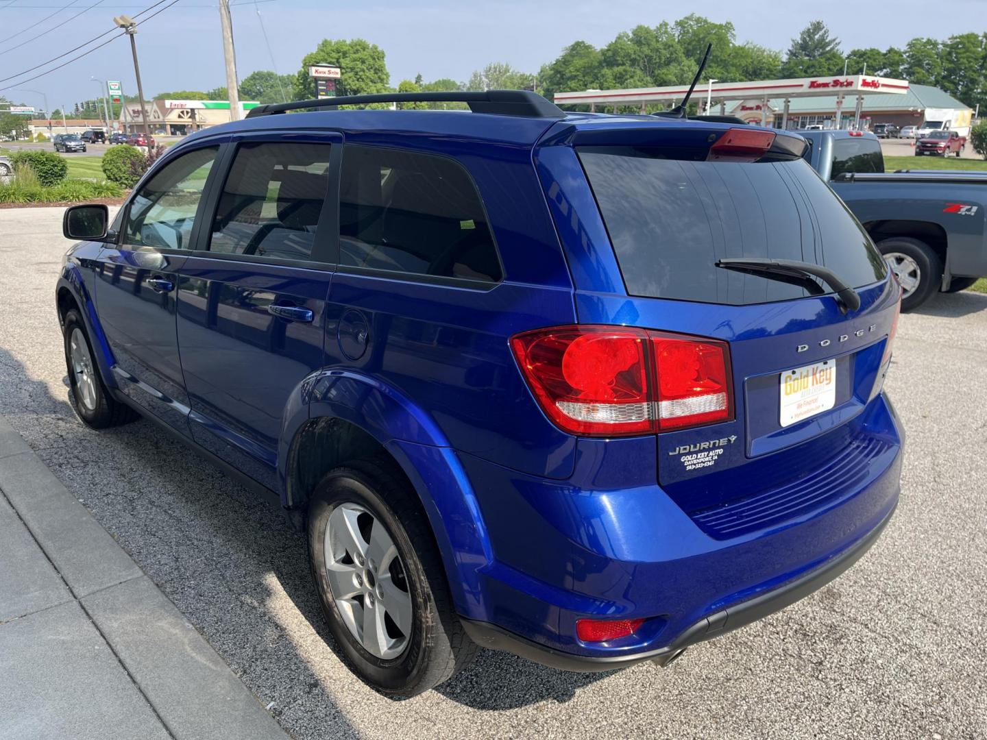 2012 Blue Pearlcoat Dodge Journey SXT (3C4PDCBG7CT) , located at 1633 W Kimberly, Davenport, IA, 52806, (563) 323-5341, 41.559456, -90.598732 - Photo#3