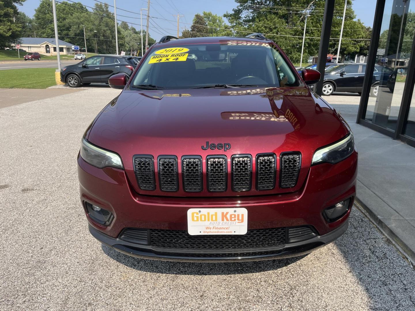 2019 Race Red Jeep Cherokee Latitude Plus 4WD (1C4PJMLX4KD) with an 3.2L V6 DOHC 24V engine, 9A transmission, located at 1633 W Kimberly, Davenport, IA, 52806, (563) 323-5341, 41.559456, -90.598732 - Photo#1