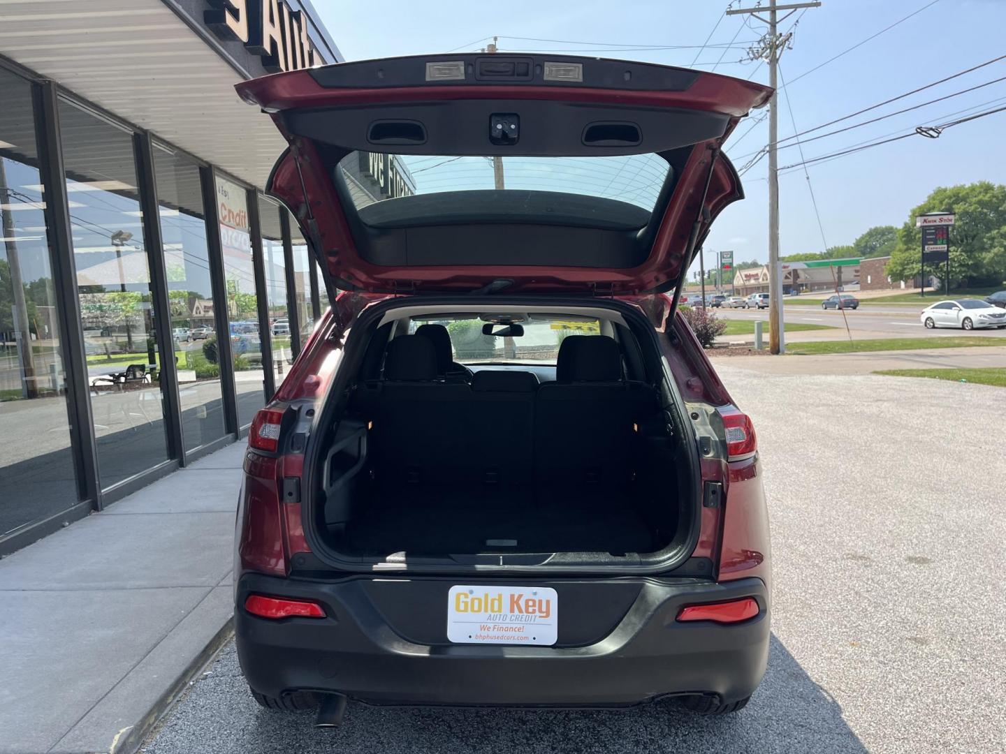 2015 Deep Cherry Red Crystal Pearlcoat Jeep Cherokee Sport (1C4PJMAB9FW) , located at 1633 W Kimberly, Davenport, IA, 52806, (563) 323-5341, 41.559456, -90.598732 - Photo#5