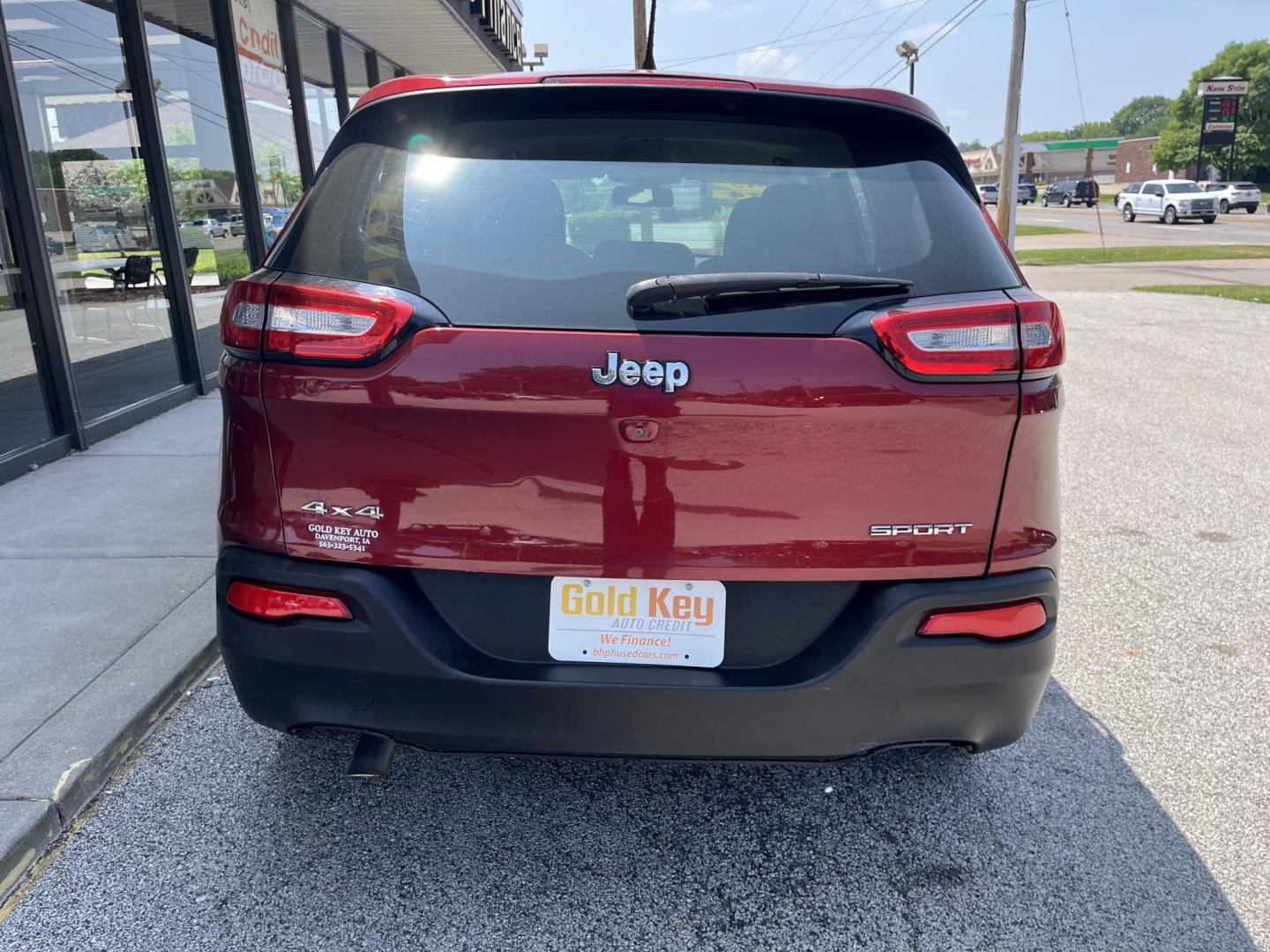 2015 Deep Cherry Red Crystal Pearlcoat Jeep Cherokee Sport (1C4PJMAB9FW) , located at 1633 W Kimberly, Davenport, IA, 52806, (563) 323-5341, 41.559456, -90.598732 - Photo#4