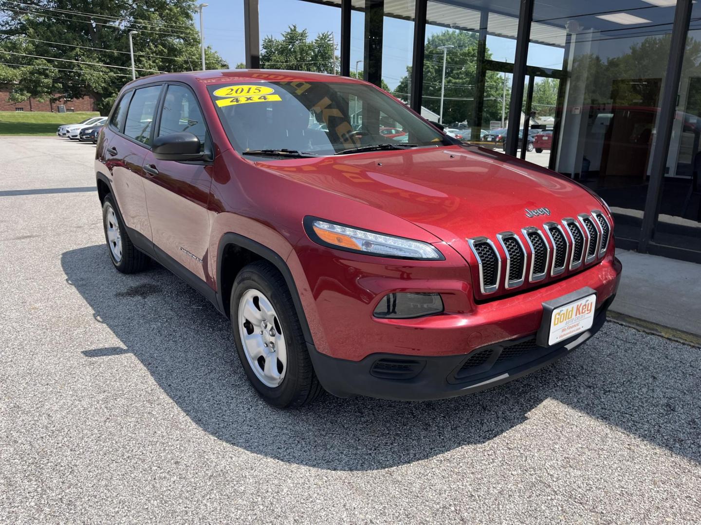 2015 Deep Cherry Red Crystal Pearlcoat Jeep Cherokee Sport (1C4PJMAB9FW) , located at 1633 W Kimberly, Davenport, IA, 52806, (563) 323-5341, 41.559456, -90.598732 - Photo#2