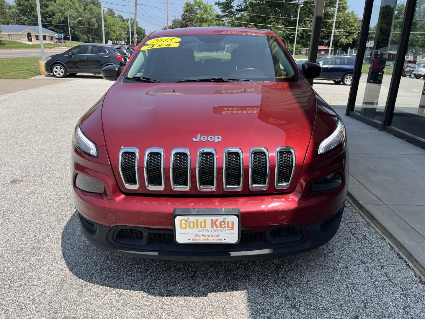 2015 Deep Cherry Red Crystal Pearlcoat Jeep Cherokee Sport (1C4PJMAB9FW) , located at 1633 W Kimberly, Davenport, IA, 52806, (563) 323-5341, 41.559456, -90.598732 - Photo#1