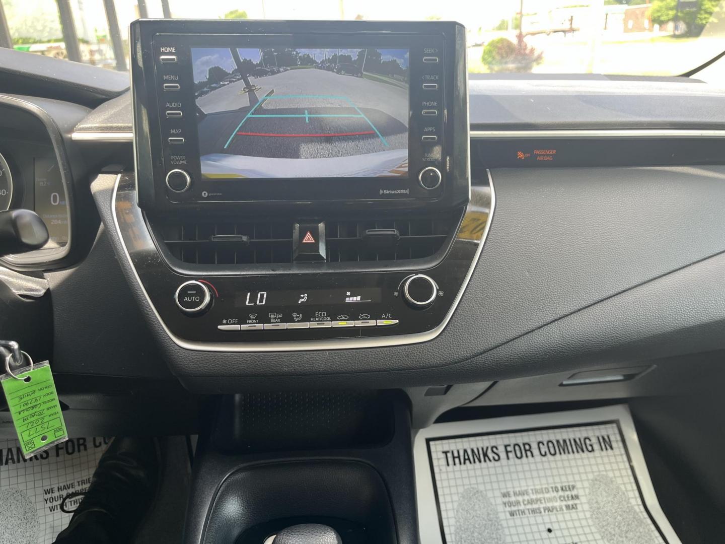 2021 Oxford White Toyota Corolla LE (JTDEPMAEXMJ) with an 1.8L L4 DOHC 16V engine, CVT transmission, located at 1633 W Kimberly, Davenport, IA, 52806, (563) 323-5341, 41.559456, -90.598732 - Photo#7