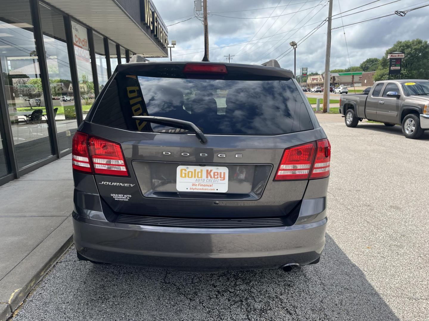 2018 Pitch Black Clear Coat Dodge Journey SE (3C4PDCABXJT) with an 2.4L L4 DOHC 16V engine, 4-Speed Automatic transmission, located at 1633 W Kimberly, Davenport, IA, 52806, (563) 323-5341, 41.559456, -90.598732 - Photo#4