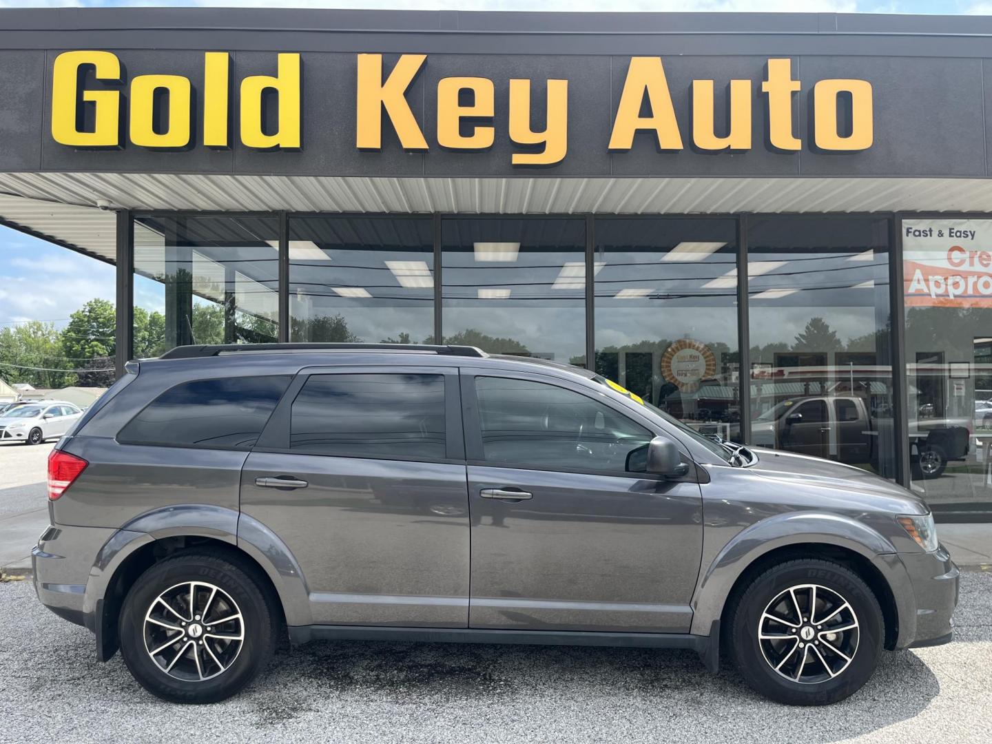 2018 Pitch Black Clear Coat Dodge Journey SE (3C4PDCABXJT) with an 2.4L L4 DOHC 16V engine, 4-Speed Automatic transmission, located at 1633 W Kimberly, Davenport, IA, 52806, (563) 323-5341, 41.559456, -90.598732 - Photo#0