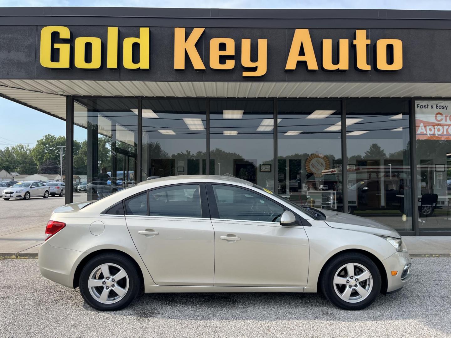 2016 Champagne Silver Metallic Chevrolet Cruze Limited LT (1G1PE5SB0G7) with an ECOTEC 1.4L I-4 DOHC engine, located at 1633 W Kimberly, Davenport, IA, 52806, (563) 323-5341, 41.559456, -90.598732 - Photo#0