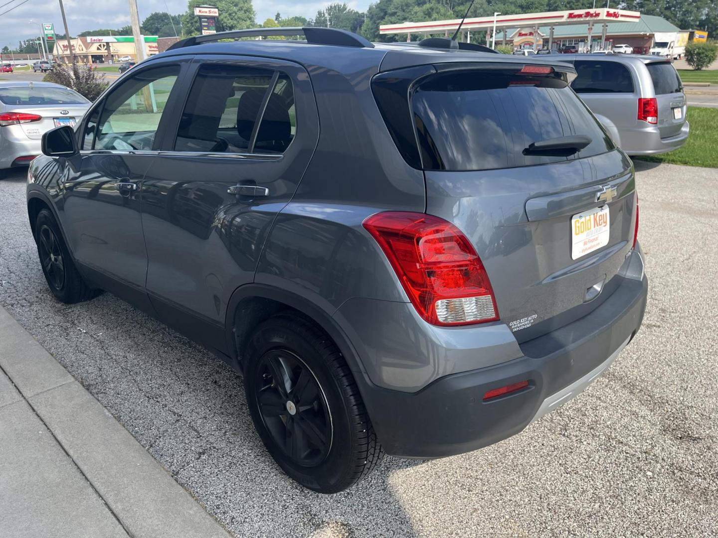2015 Silver Ice Metallic Chevrolet Trax LT (KL7CJLSBXFB) with an Ecotec 1.4L I-4 DOHC engine, located at 1633 W Kimberly, Davenport, IA, 52806, (563) 323-5341, 41.559456, -90.598732 - Photo#3