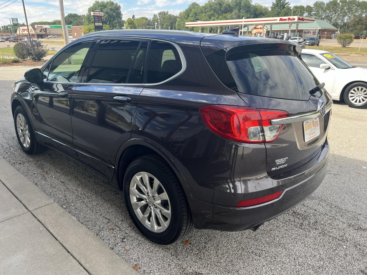 2017 Midnight Amethyst Metallic Buick Envision Essence (LRBFXDSA7HD) with an 2.5L I-4 gasoline direct injection engine, located at 1633 W Kimberly, Davenport, IA, 52806, (563) 323-5341, 41.559456, -90.598732 - Photo#3