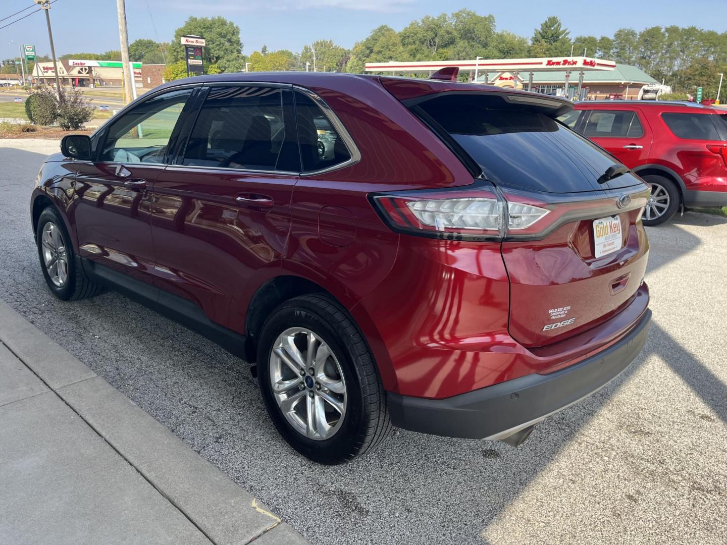 2016 Ruby Red Metallic Tinted Clearcoat Ford Edge SEL (2FMPK4J83GB) , located at 1633 W Kimberly, Davenport, IA, 52806, (563) 323-5341, 41.559456, -90.598732 - Photo#3
