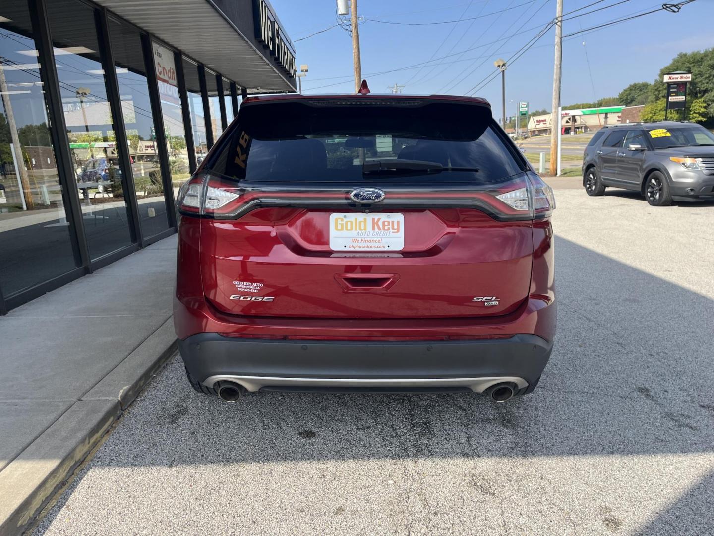 2016 Ruby Red Metallic Tinted Clearcoat Ford Edge SEL (2FMPK4J83GB) , located at 1633 W Kimberly, Davenport, IA, 52806, (563) 323-5341, 41.559456, -90.598732 - Photo#4