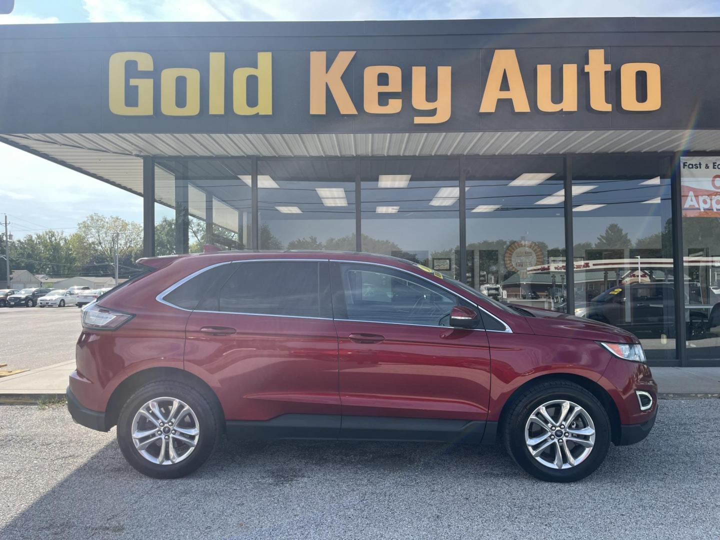 2016 Ruby Red Metallic Tinted Clearcoat Ford Edge SEL (2FMPK4J83GB) , located at 1633 W Kimberly, Davenport, IA, 52806, (563) 323-5341, 41.559456, -90.598732 - Photo#0