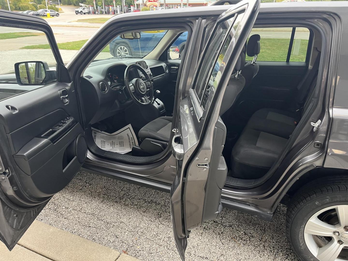 2016 Gun Metallic Jeep Patriot Latitude 4WD (1C4NJRFB8GD) with an 2.4L L4 DOHC 16V engine, located at 1633 W Kimberly, Davenport, IA, 52806, (563) 323-5341, 41.559456, -90.598732 - Photo#8