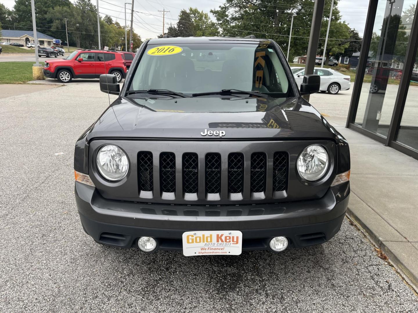2016 Gun Metallic Jeep Patriot Latitude 4WD (1C4NJRFB8GD) with an 2.4L L4 DOHC 16V engine, located at 1633 W Kimberly, Davenport, IA, 52806, (563) 323-5341, 41.559456, -90.598732 - Photo#1
