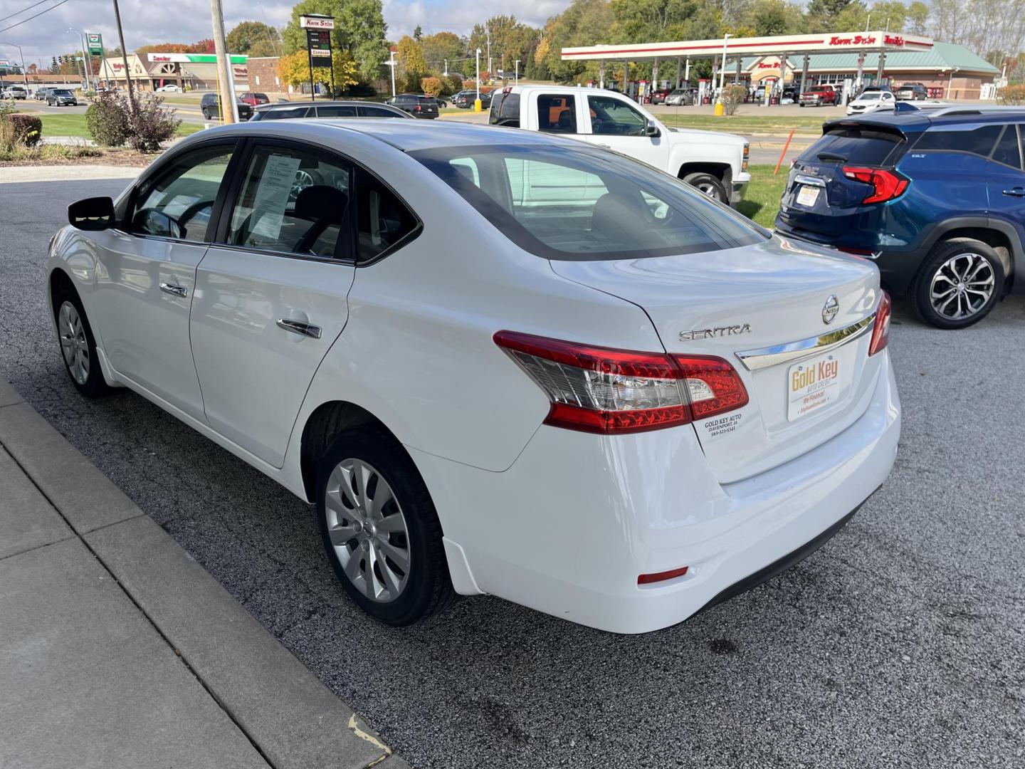 2015 Aspen White Nissan Sentra S (3N1AB7AP9FY) with an 1.8L I-4 DOHC engine, located at 1633 W Kimberly, Davenport, IA, 52806, (563) 323-5341, 41.559456, -90.598732 - Photo#3