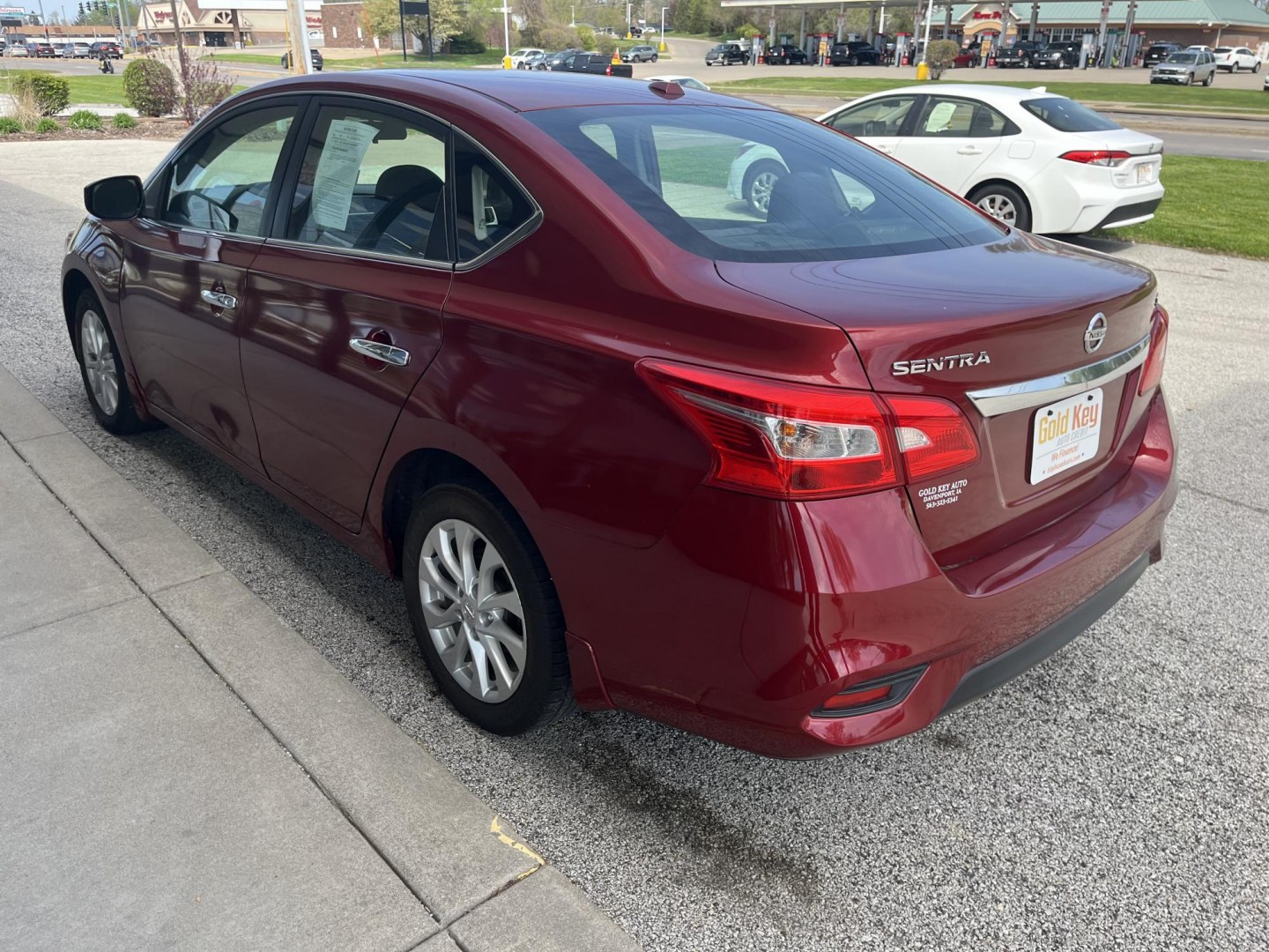 2018 Red Alert Nissan Sentra SV (3N1AB7AP3JY) with an 1.8L I-4 DOHC engine, located at 1633 W Kimberly, Davenport, IA, 52806, (563) 323-5341, 41.559456, -90.598732- Photo#3