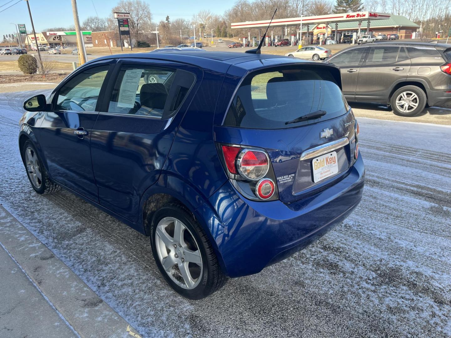 2014 Blue Topaz Metallic Chevrolet Sonic LTZ Auto 5-Door (1G1JE6SB5E4) with an 1.4L L4 DOHC 24V TURBO engine, 6-Speed Automatic transmission, located at 1633 W Kimberly, Davenport, IA, 52806, (563) 323-5341, 41.559456, -90.598732 - Photo#3