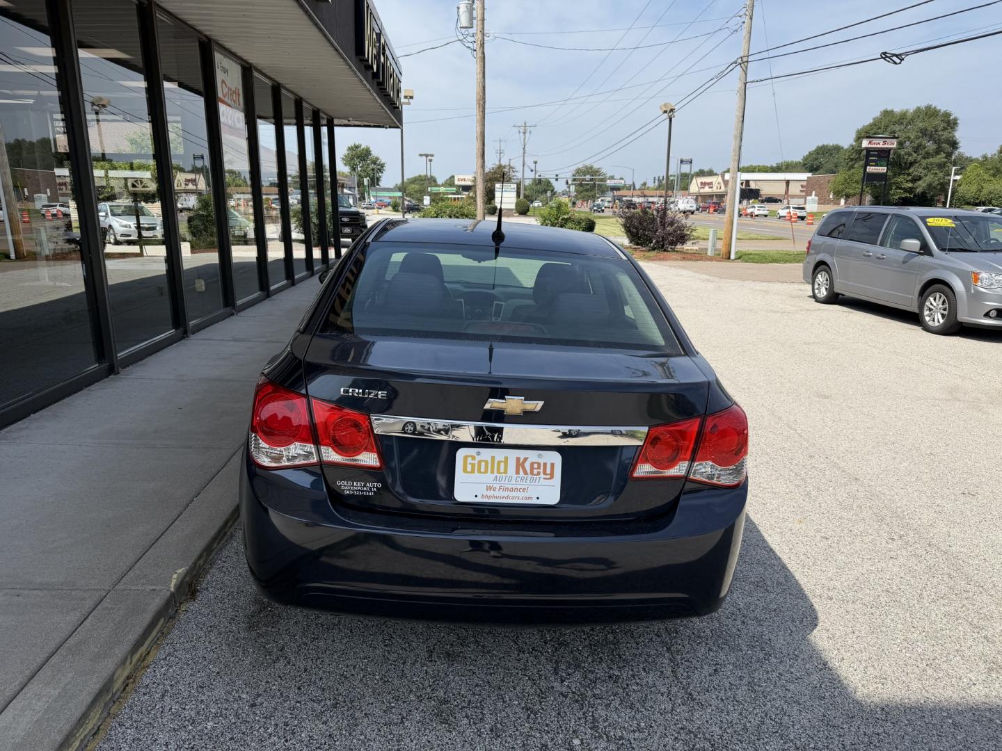 2014 Blue Ray Metallic /Jet Black/Medium Tit Chevrolet Cruze LS Auto (1G1PA5SG4E7) with an 1.8L L4 DOHC 16V engine, 6-Speed Automatic transmission, located at 1633 W Kimberly, Davenport, IA, 52806, (563) 323-5341, 41.559456, -90.598732- Photo#3