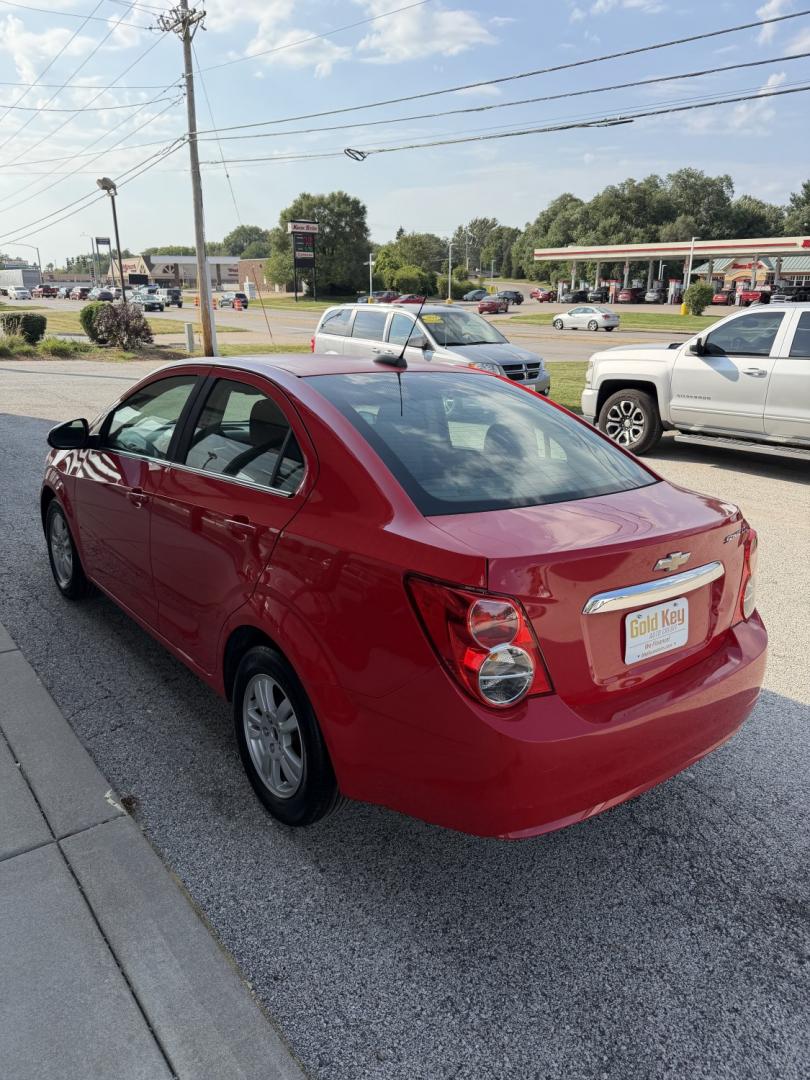 2015 Red Hot /Jet Black/Brick Chevrolet Sonic LT Auto Sedan (1G1JC5SG3F4) with an 1.8L L4 DOHC 24V engine, 6-Speed Automatic transmission, located at 1633 W Kimberly, Davenport, IA, 52806, (563) 323-5341, 41.559456, -90.598732- Photo#4