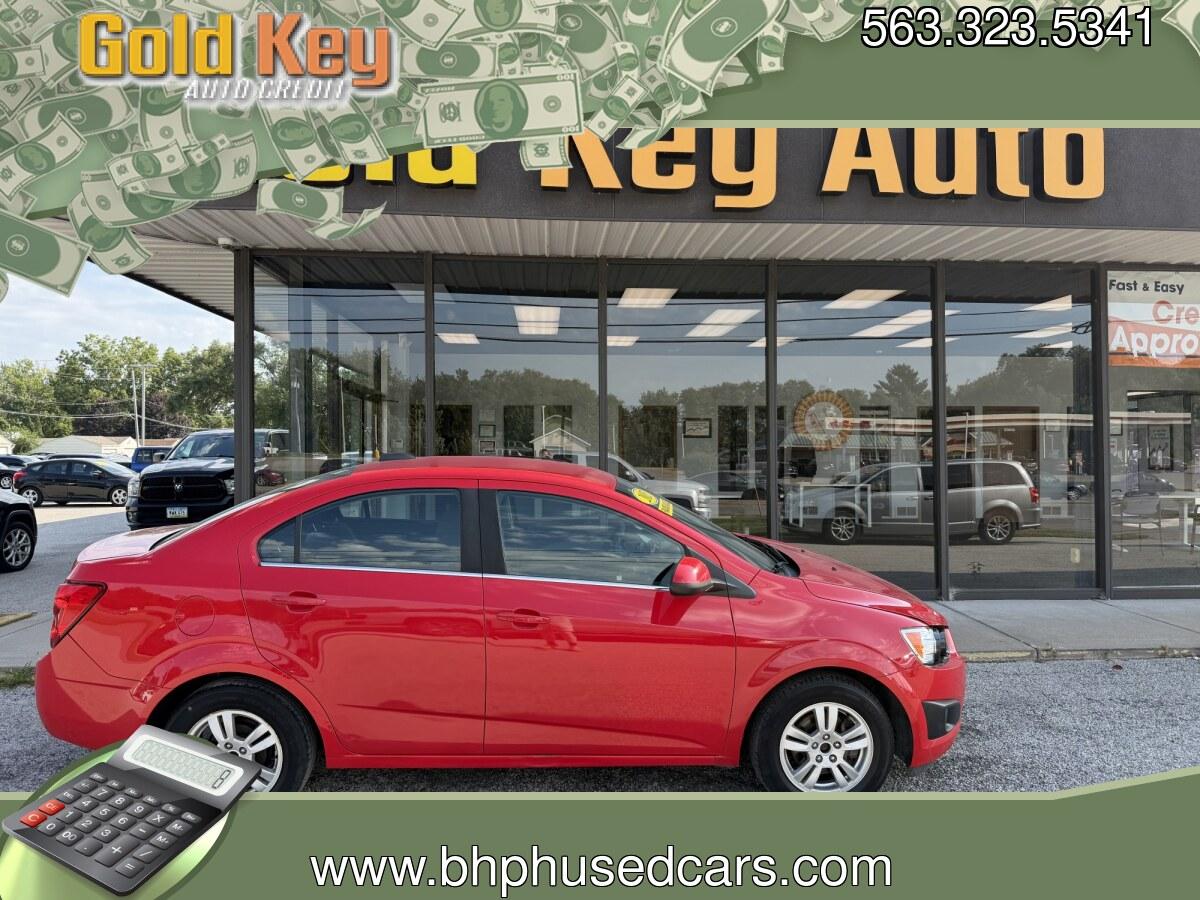 2015 Red Hot /Jet Black/Brick Chevrolet Sonic LT Auto Sedan (1G1JC5SG3F4) with an 1.8L L4 DOHC 24V engine, 6-Speed Automatic transmission, located at 1633 W Kimberly, Davenport, IA, 52806, (563) 323-5341, 41.559456, -90.598732- Photo#0